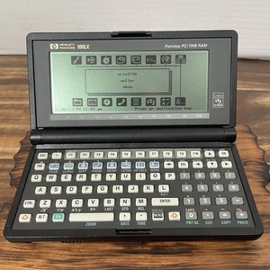 Hewlett Packard HP 100LX 1MB Palmtop PC w 2MB Card and Manual Works - Photo 1/11