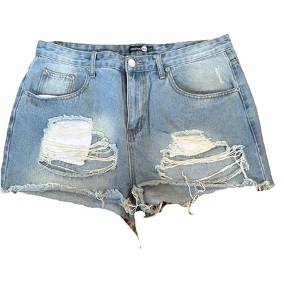 Pantalones cortos de mezclilla BOOHOO azul desgastado corte 1” entrepierna para mujer talla 12 Foto 1 de 3