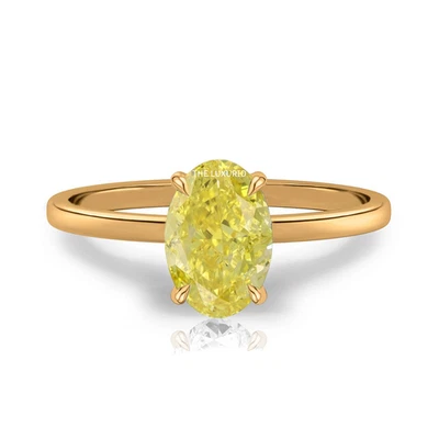 Anillo de diamantes de oro amarillo de 14 quilates 1,20 quilates IGI cultivado en laboratorio corte ovalado elegante amarillo intenso Foto 1 de 4