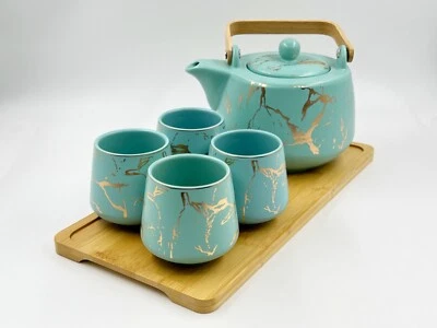 Juego de té de Kung Fu con patrón aleatorio dorado Morden con bandeja de bambú, tetera y tazas de té Foto 1 de 4