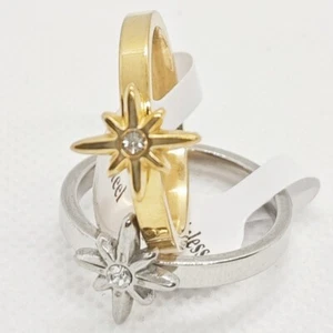 Venta al por mayor 36 piezas Anillos de acero inoxidable arco interior circón intermedio en forma de estrella - Imagen 1 de 6