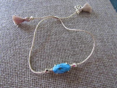 Brazalete Kendra Scott Everlyne con cordón de oro en piedra turquesa veteada de bronce Foto 1 de 3