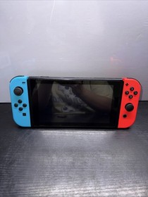 Nintendo Switch 32GB Console with Red And Blue Joy‑Con HAC-001(-01)