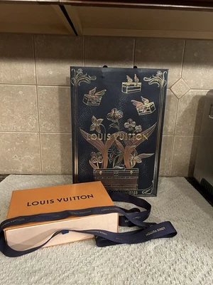 Louis Vuitton Holiday 2025 Edición Limitada Bolso de Compras Caja y Cinta Azul Foto 1 de 3