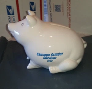 Hucha de cerámica Cruz azul "Sausage Grinder Survivor" hecha en EE. UU. 5" de alto - Imagen 1 de 6