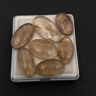 Natural Golden Rutile Quartz Oval Cabochon 14*23-17*32 MM 158 CT 8 Pcs - Image 1 of 3