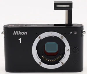Nikon 1 J1 Systemkamera 10.1 Megapixel 3 Zoll Display schwarz OHNE Objektiv - Bild 1 von 4