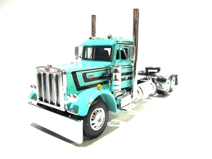 DCP / FIRST GEAR 1/64 SCALE 359 PETERBILT DAY CAB, TEAL WITH BLACK STRIPE - Picture 1 of 6
