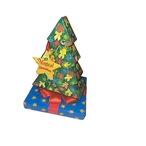 Eine magische Weihnachtsspieluhr mit Weihnachtsbüchern spielt rasend durch den Schnee" - Bild 1 von 7