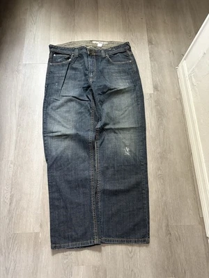 Pantalones de mezclilla para hombre holgados skater DKNY bordados bolsillo trasero talla 38X32 Foto 1 de 3