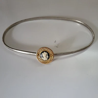 Cinturón elástico vintage años 80 de metal dorado con hebilla camafeo azul Foto 1 de 4