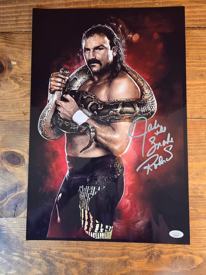 Foto firmada por Jake 'The Snake' Roberts 12x18 WWE WWF autógrafo JSA Foto 1 de 3