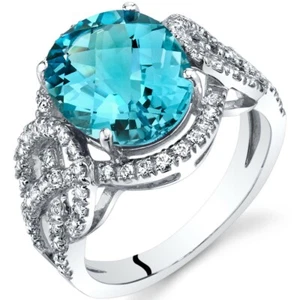 Anillo destacado halo de topacio azul suizo de oro blanco 14K 4,00 quilates - Imagen 1 de 3