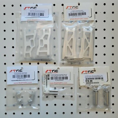 STRC Aluminum SILVER ~ 5 Item Lot ~ Rustler / Stampede Arms, Shock Bodies, Block - Image 1 of 4