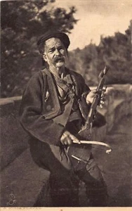Montenegro - A Guzla player - Publ. Rapahel Tuck & Sons - Bild 1 von 2