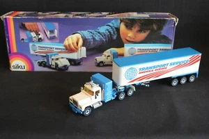 Siku Mack 12M Box Van "Transport-Service" 1:55 #3117 (J&KvW) - Bild 1 von 9
