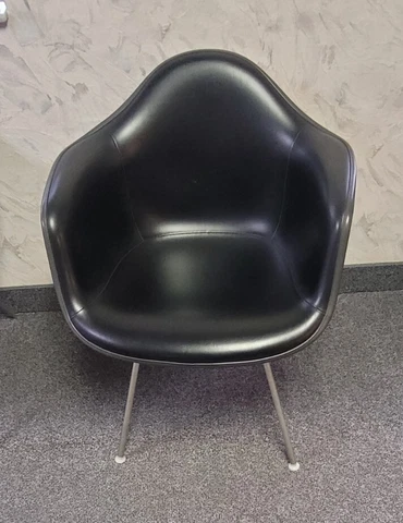 Vintage Eames bucket chair. Herman Miller Cover