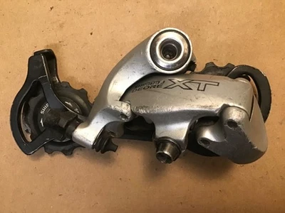 Desviador trasero de bicicleta de montaña Shimano Deore XT RD-M750 9 velocidades jaula larga Foto 1 de 4