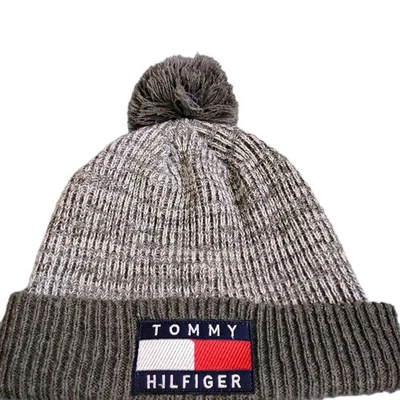 Pom pompón tejido grueso gris frijol años 2000 TOMMY HILFIGER HOMBRE Foto 1 de 4