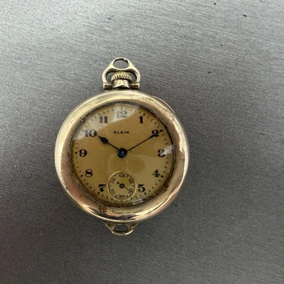 Reloj Bolsillo Elgin 31mm Esfera Dorada Lleno de Oro Cuerda Manual Grado 463 Funciona Foto 1 de 4