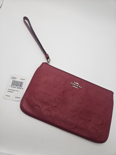 Coach F30248 Polso firmato grande cerniera in rilievo rosa caldo nuovo con etichette