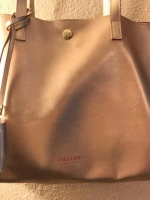Bolso de Mano Shiseido Imitación Cuero sintético Color Bronce con Etiqueta y Bloqueo Magnético Nuevo Foto 1 de 2