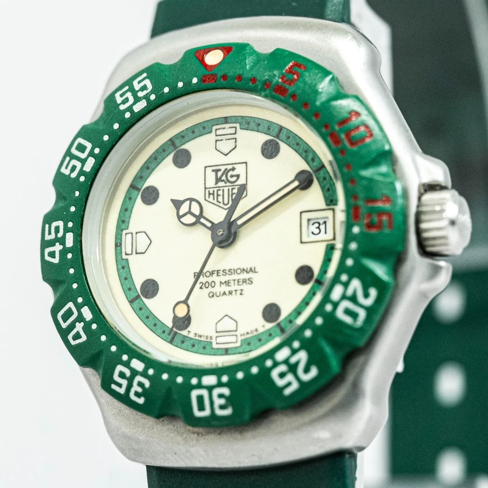 Sin tarifas *CASI COMO NUEVO* ETIQUETA Heuer Formula 1 Pro 200 m 372,508 Qz verde 28 mm damas Foto 1 de 4