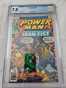 POWER MAN 48 CGC 7.0 WHITE PAGES 1977 1ST MEETING W/ IRON FIST JOHN BYRNE ART - Picture 1 of 3
