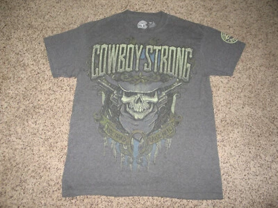 CAMISETA VAQUERO STRONG RIDE HARD RISE HELL MARCA CON LICENCIA FUERA DE LA LEY CALAVERA ESQUELETO Foto 1 de 4