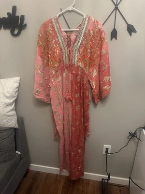 Mono indio con cuentas a mano Foto 1 de 4