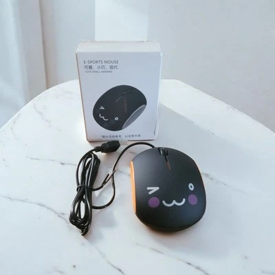 Lindo ratón para deportes electrónicos con cable negro y naranja  Foto 1 de 2