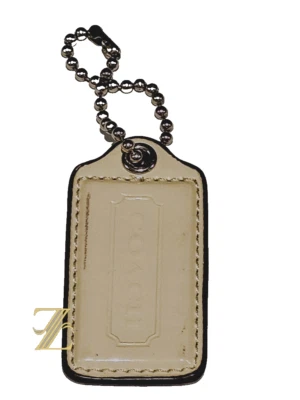 COACH✨Dije de llavero con etiqueta colgante✨No pagues el precio de venta sugerido por el fabricante de COACH $55.00 por el TLC de tu bolso Foto 1 de 4