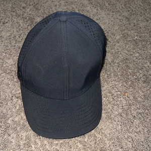 Melin Hat Cap A-Game Hydro Performance Snap Back Classic 60CM Black - Picture 1 of 4