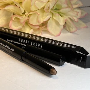 Bâton d'ombre crème longue tenue Bobbi Brown - Bronze - Taille réelle Neuf dans sa boîte livraison gratuite - Photo 1/1