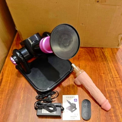 Máquina sexual automática empujando enorme consolador masturbador remoto juguetes sexuales para mujeres Foto 1 de 4