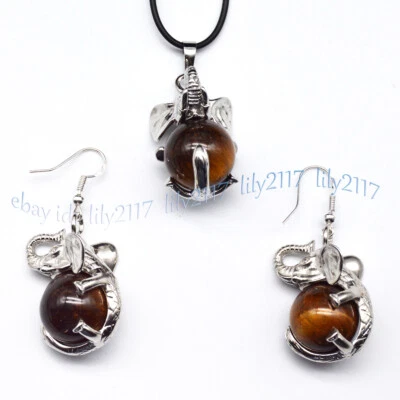 Conjunto de aretes colgantes de bola de elefante bola de piedras preciosas ojo de tigre amarillo natural Foto 1 de 4