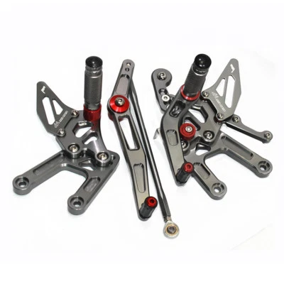 Juego de pedales traseros ajustables MAD-MOTO YAMAHA YZF-R6 2006-2016 juego trasero Foto 1 de 4