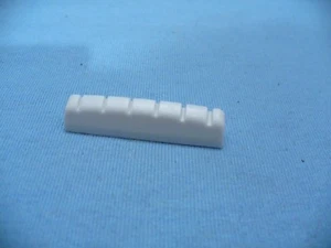 PLASTIC ABS SLOTTED CURVED BOTTOM NUT FOR A SG - LP GUITAR NECK USA SHIPPING !! - Picture 1 of 5