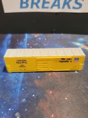 UNION PACIFIC UP 499051 BOXCAR VINTAGE N SCALE. YELLOW just shell nothing insid - Image 1 of 4