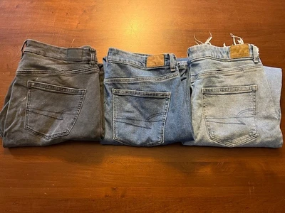 American Eagle Women's Stretch Black Wash and Blue Jeans Size 12 Long - 3 Pairs - Image 1 of 4