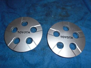 Toyota Celica 1983-86 2 x NOS Genuine Toyota 5 Stud Wheel Centre Caps - Picture 1 of 3
