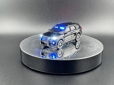 1/64 Greenlight Black Ford Explorer With Exclusive Led Blue Light Package - Image 1 of 4
