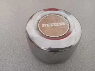MAZDA B2200 1987-1993 Pick Up Truck Wheel Center Cap OEM USED - Image 1 of 4