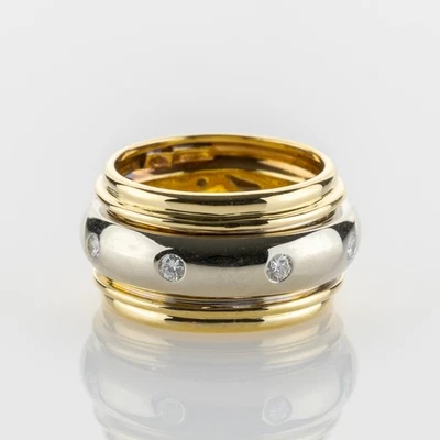 Anillo giratorio de diamantes de 0,30 quilates en oro amarillo y blanco de 18 quilates Foto 1 de 3