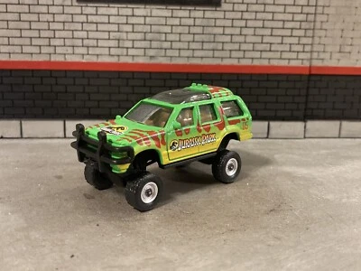 Camión Ford Explorer 1993 elevado 4x4 1/64 diecast personalizado Matchbox Jurassic Park Foto 1 de 4