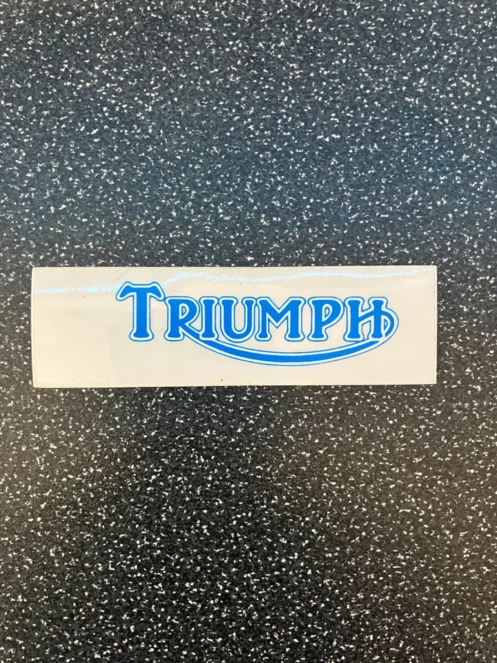 Triumph - 2 off vinyl self adhesive sticker 90x25mm (Blue on clear) - Image 1 of 1