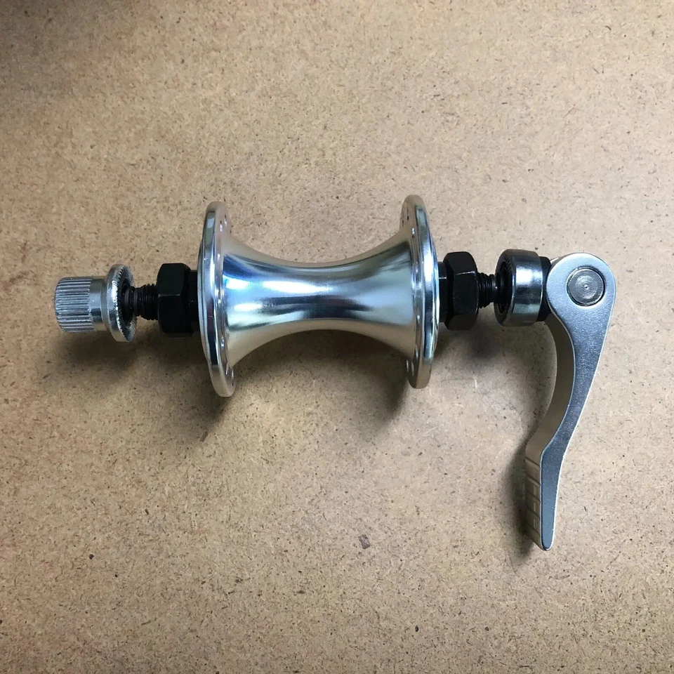 Nuevo buje estrecho delantero de aleación para bicicleta ELEGIDO con liberación rápida 14G 24H plateado Foto 1 de 1