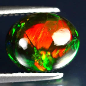 2.83 ct Remarkable Oval Cabochon (11 x 9 mm) Ethiopian Flashing Black Opal - Picture 1 of 2