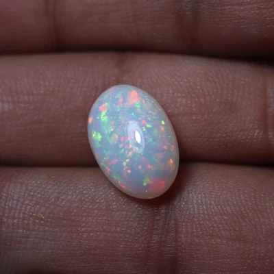 6.3 Cts 16.5x11 MM Natural AAA Red Green Fire Ethiopian Opal Oval Cabochon - Image 1 of 4