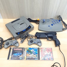 Sega Saturn console with Virtua Gun, Virtua Stick, 2 controllers & 3 Games Japan